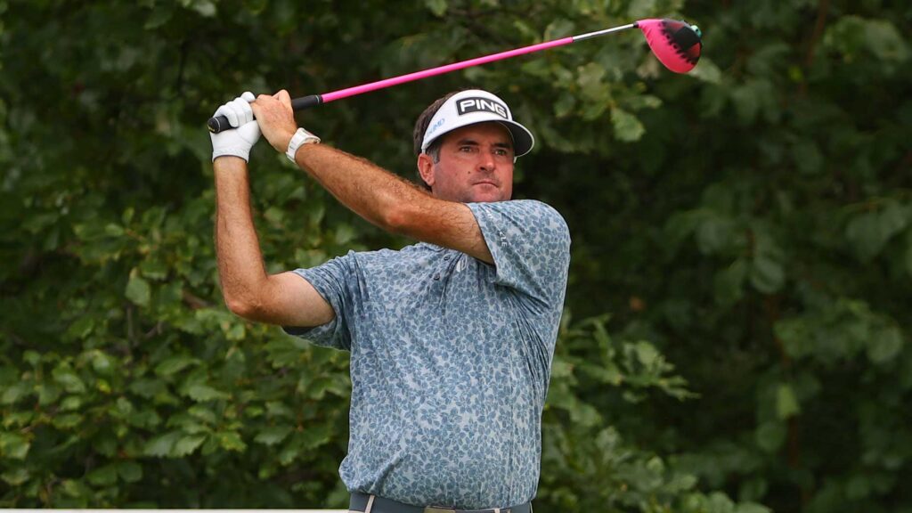 A view of Bubba Watson holding his club after hitting a shot