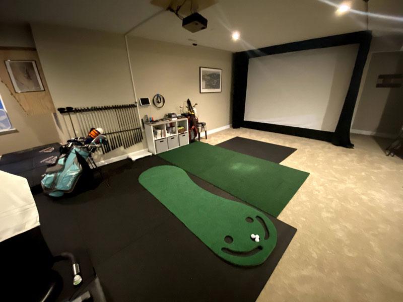 An indoor garage space for golf practice