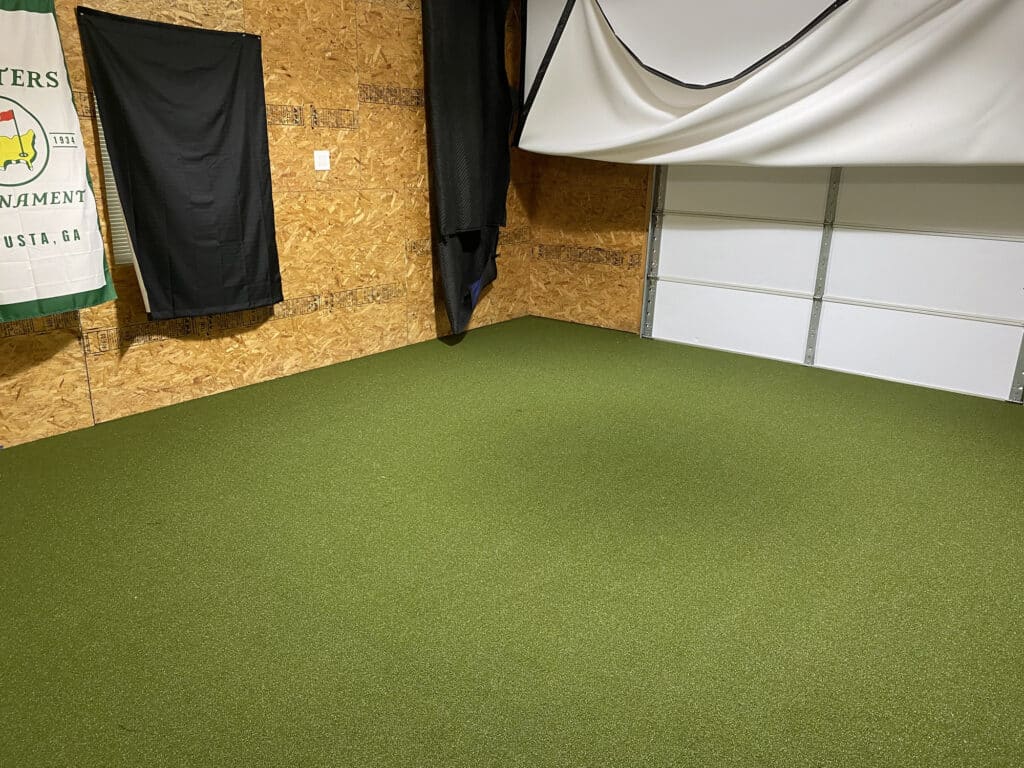 A floor view of garage golf simulator