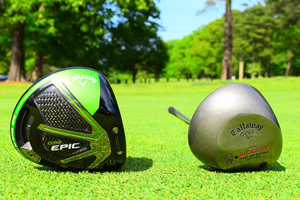 A view of two new and advanced golf clubs in grass