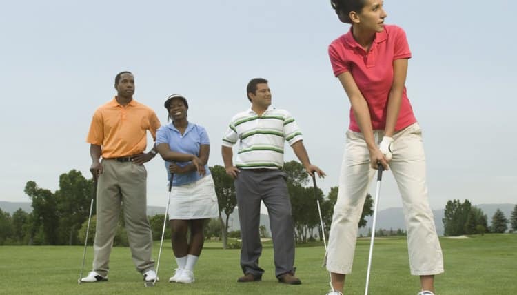 People playing 4-ball golf