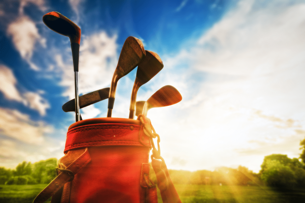 A view of golf clubs inside a bag