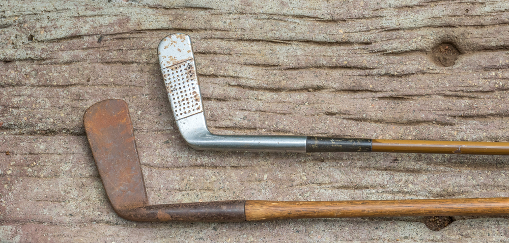 A view of two hickroy shaft golf clubs