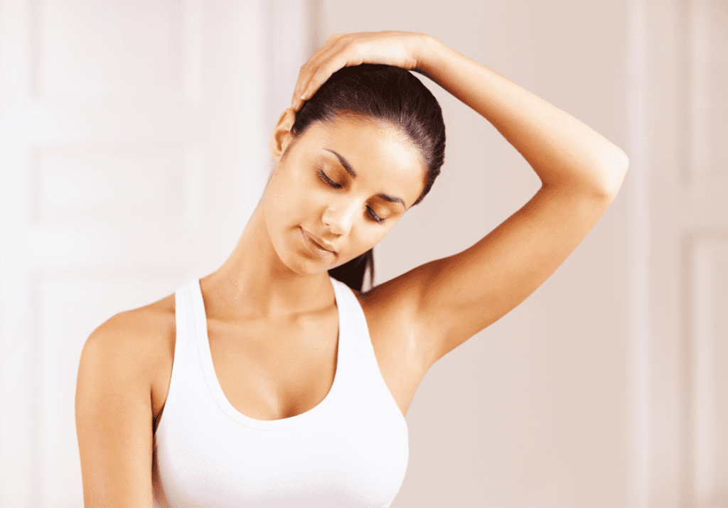 a girl doing neck stretches