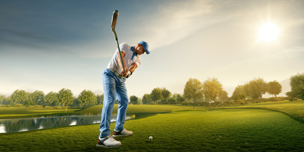 Golfer with golf club taking a shot